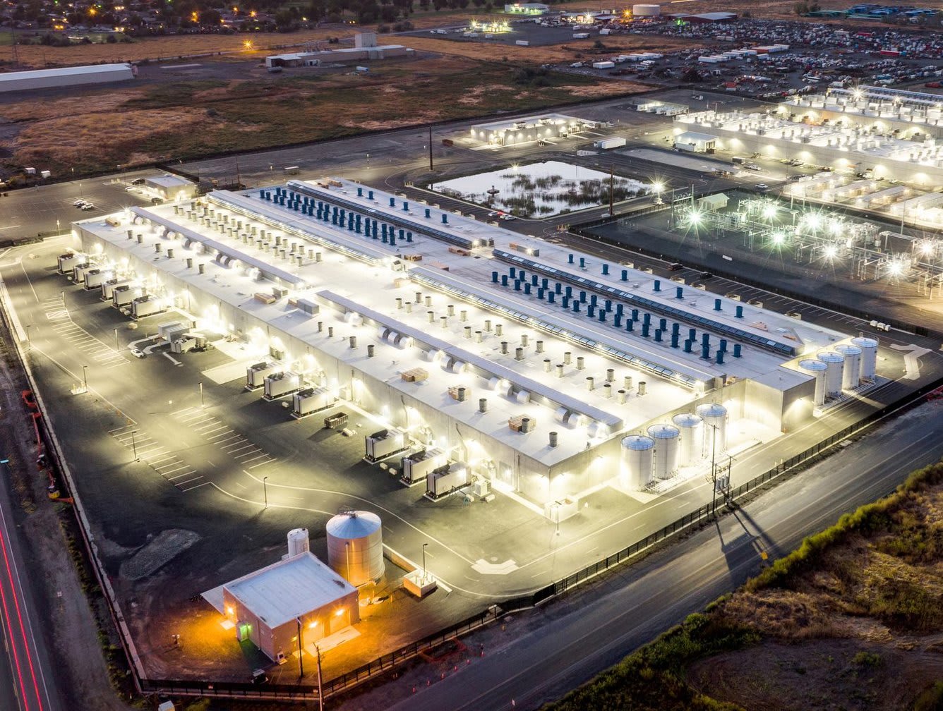 Hyperscale data center campus aerial view at dusk