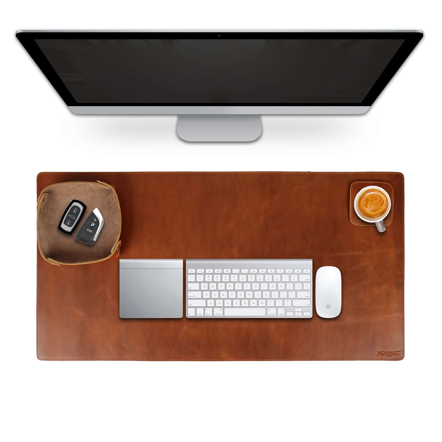 Brown leather desk mat with keyboard and mouse on a clean, organized modern desk setup