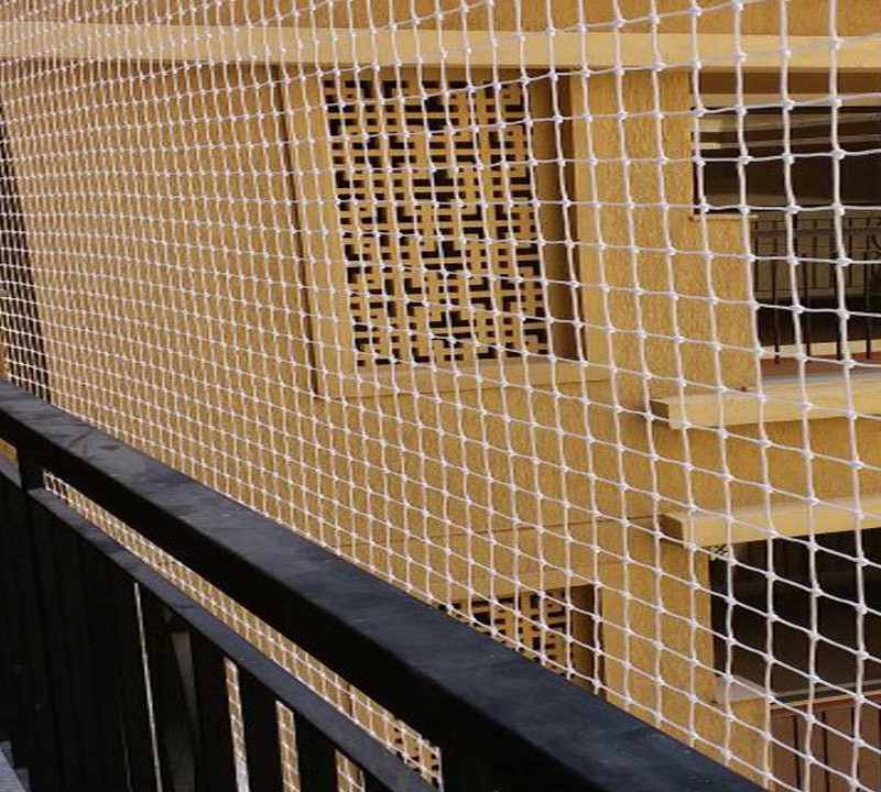 Balcony covered with safety net