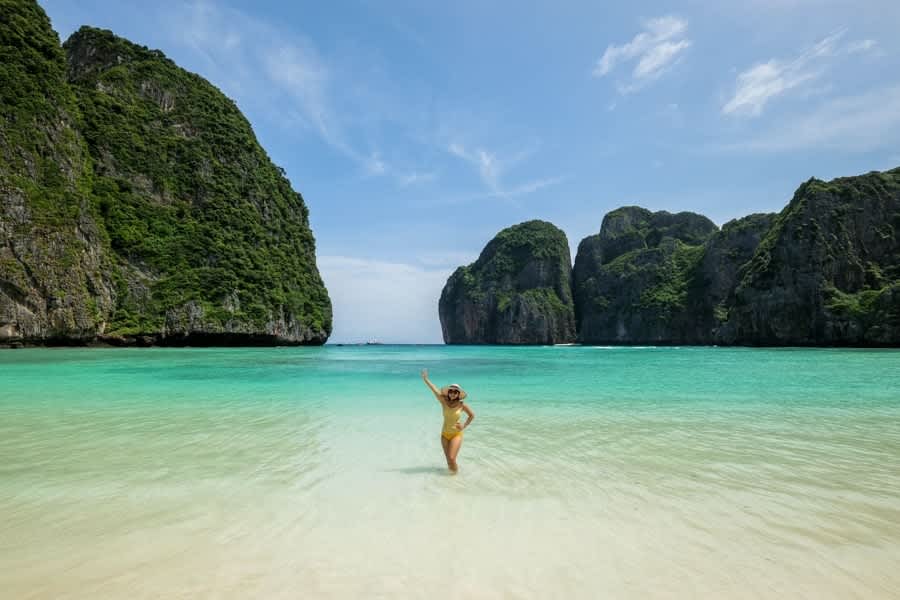Crystal clear water at Maya Bay with limestone cliffs, Thailand