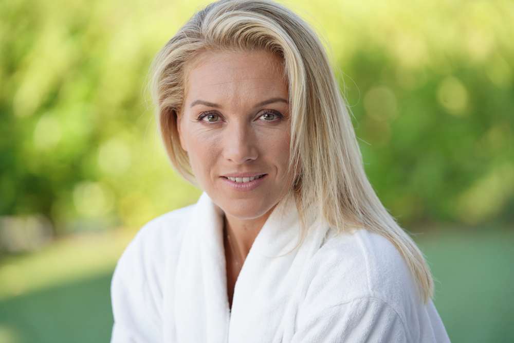 Woman in her 40s wellness lifestyle portrait