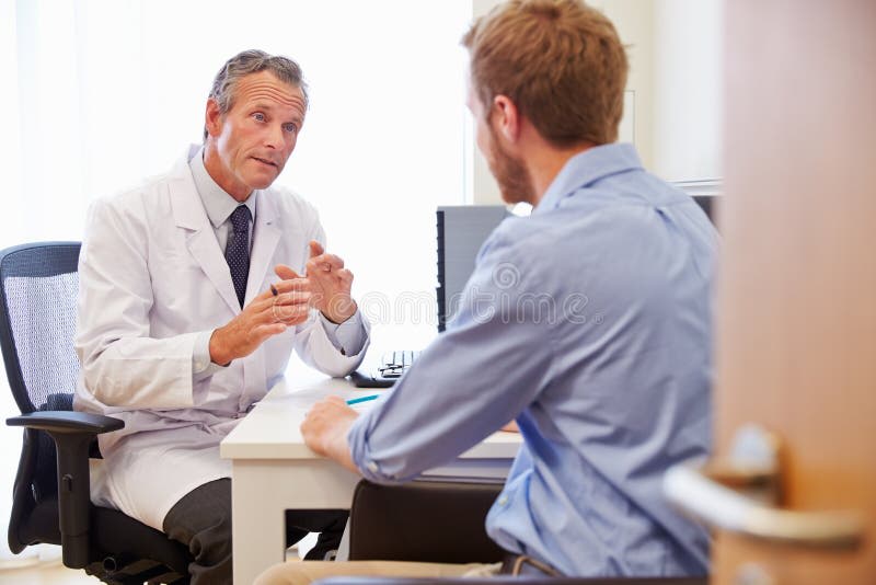 Doctor consulting with patient