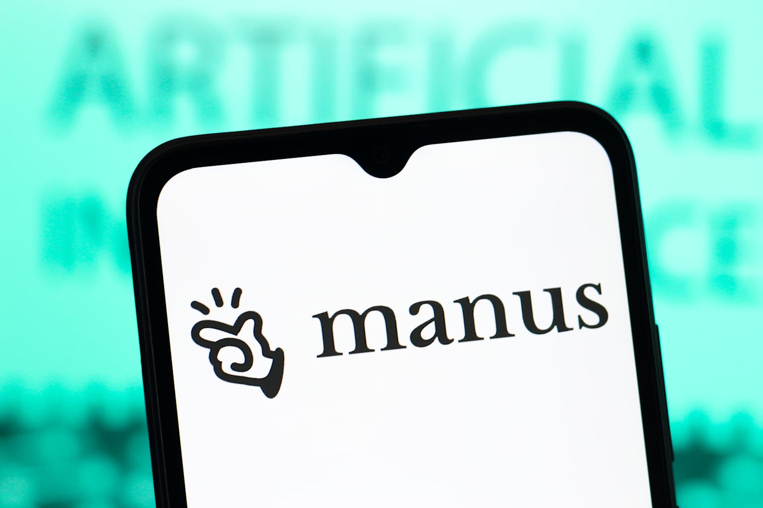 In this photo illustration, the Manus AI logo is seen...