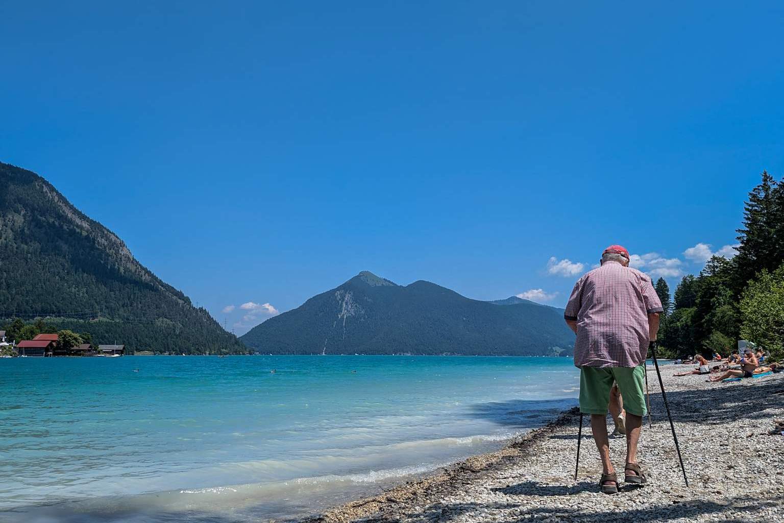 Senior Citizen On A Walk Along The Beach