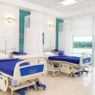 Hospital room with modern medical beds and facilities in Salt Lake City, Kolkata