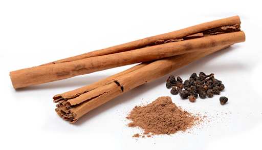 Dried bark strips, bark powder, and flowers of Cinnamomum verum.