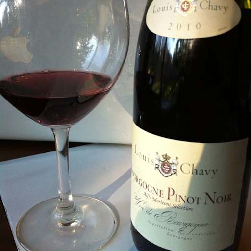 Bottle of Louis Chavy 2010 Bourgogne Pinot Noir Vieilles Vignes and a wine glass.