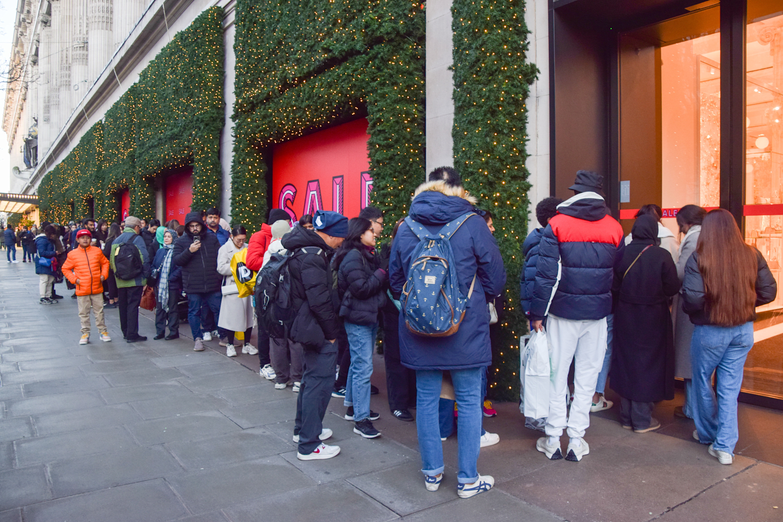 Customers queue outside Selfridges department store on...