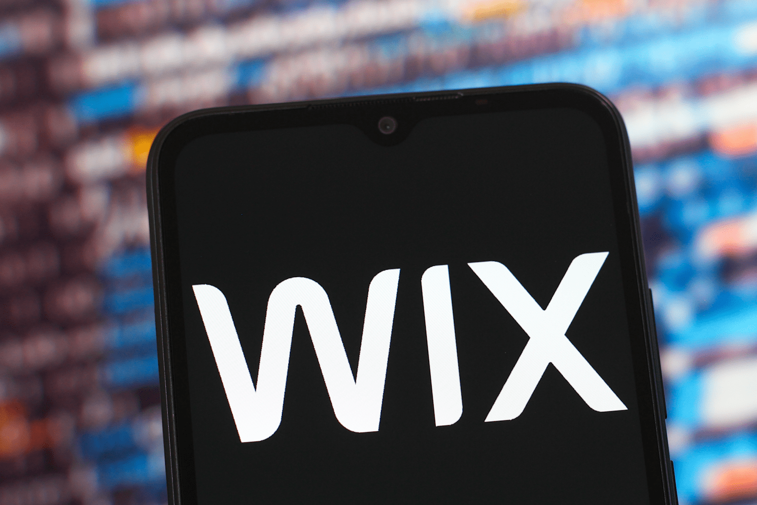 In this photo illustration, the Wix logo is seen displayed...