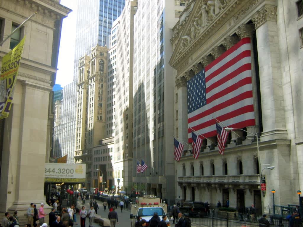 The iconic New York Stock Exchange building on Wall Street, a symbol of American finance