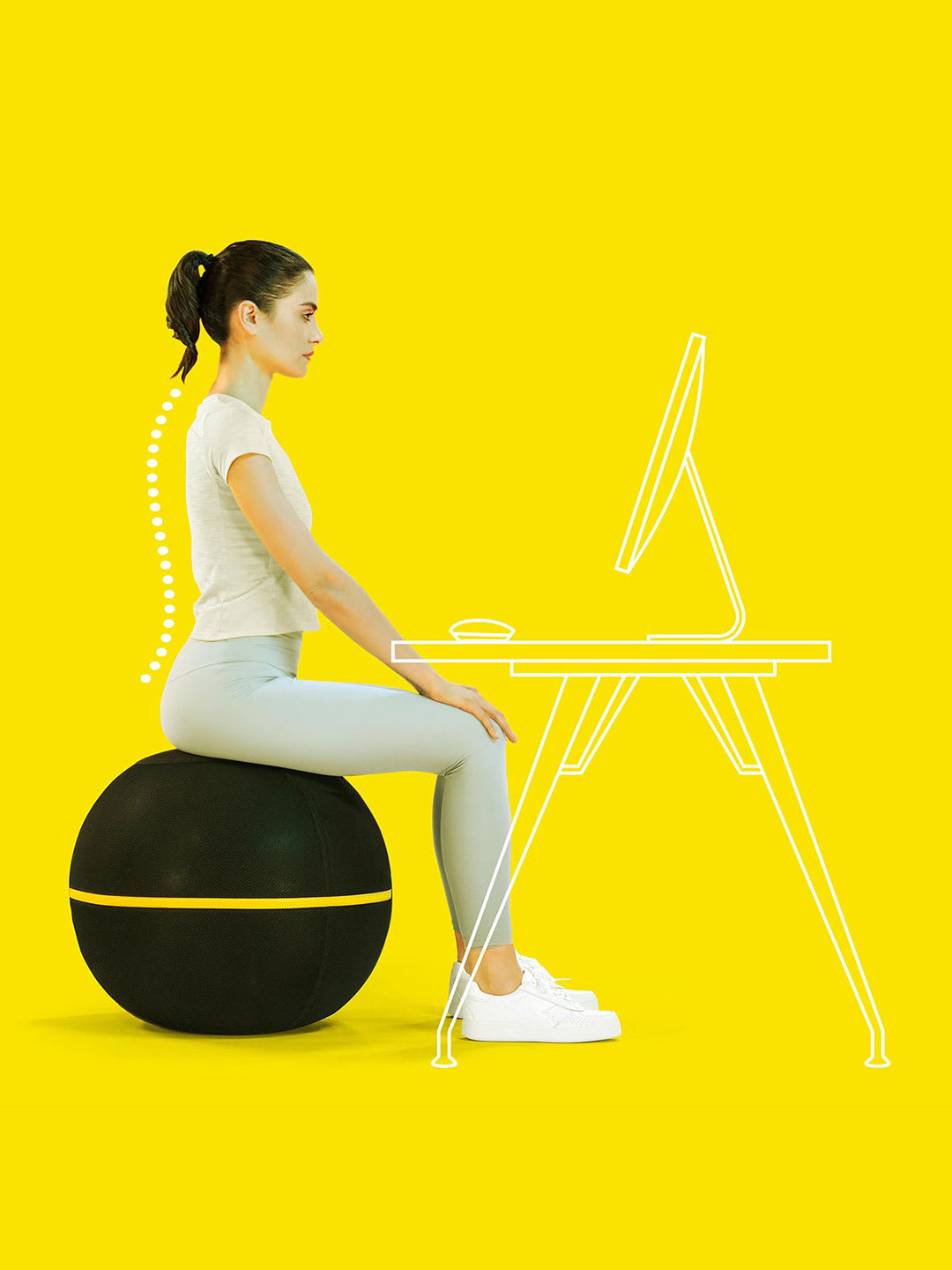 A woman sits on an exercise ball, demonstrating active sitting.