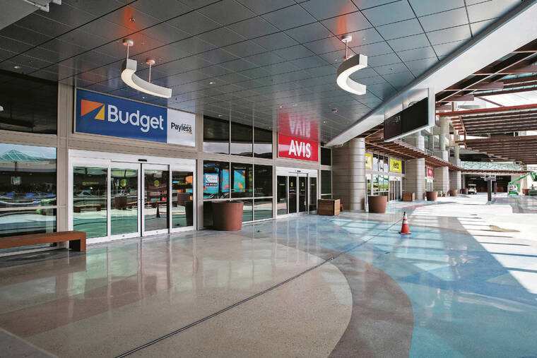 Rental car facility entrance at Honolulu airport featuring major rental companies