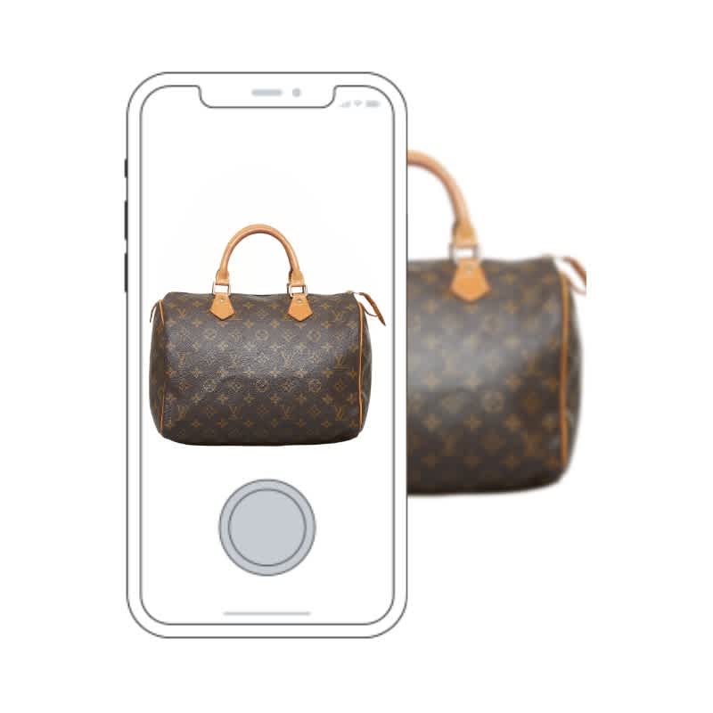 A Louis Vuitton Speedy bag displayed on a smartphone screen, illustrating the use of digital tools for luxury bag authentication