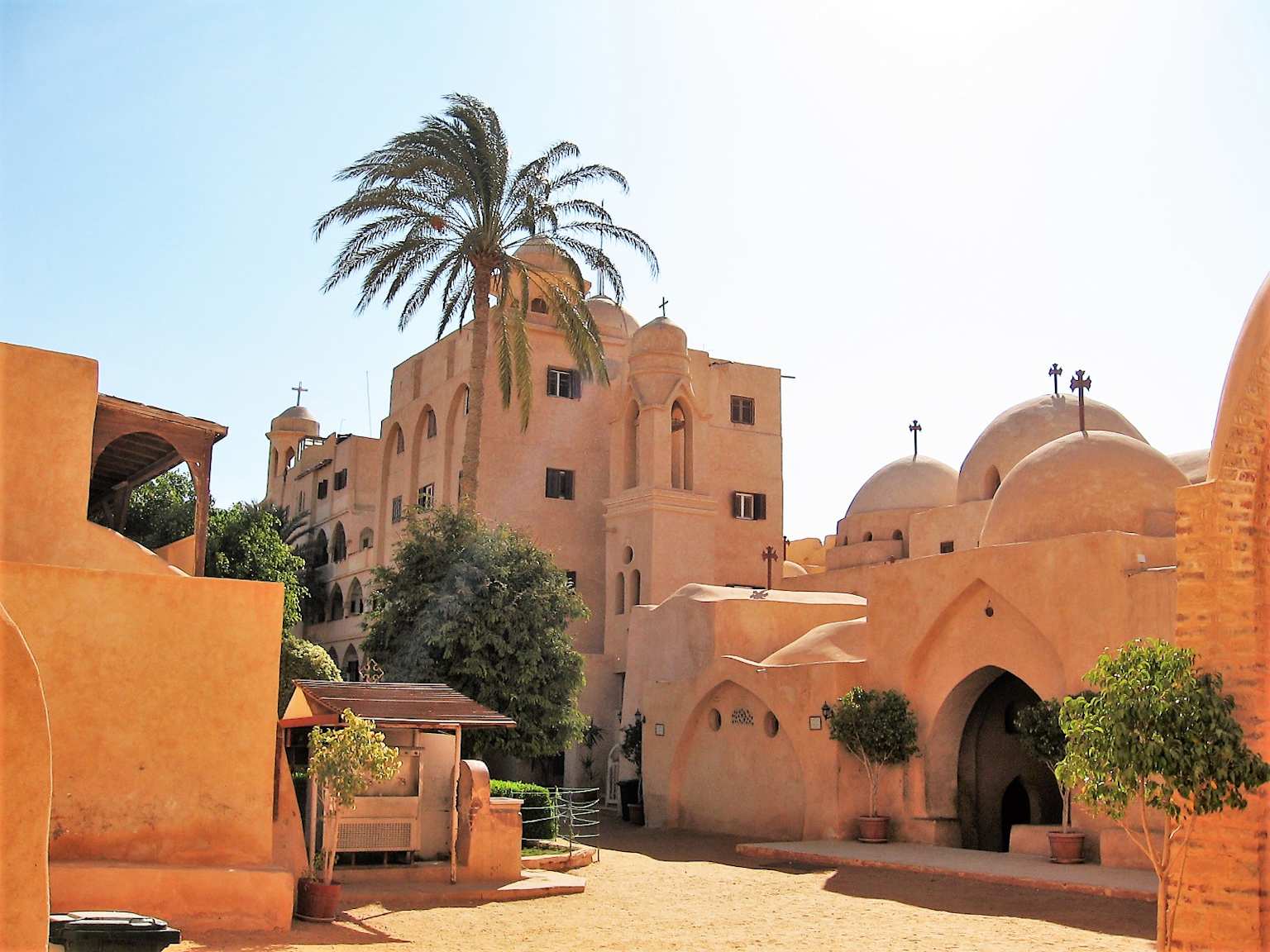 Monastery of Saint Pishoy in Wadi El Natrun, Egypt, featuring its unique architecture and courtyard