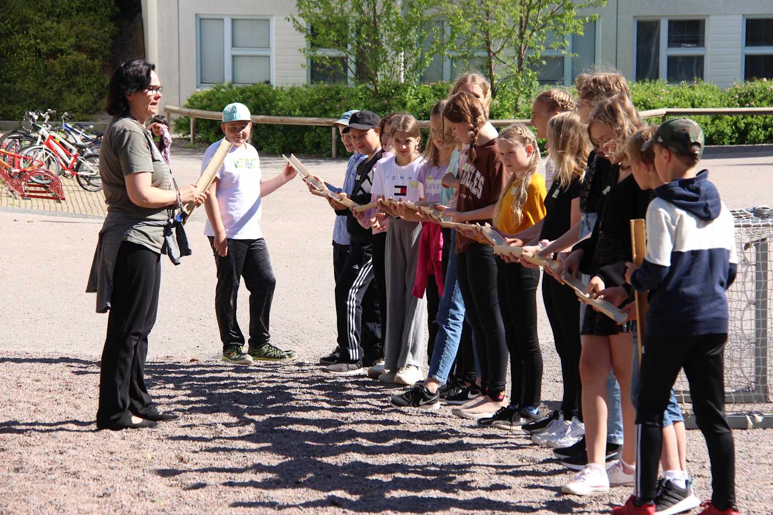 Students participate in a hands-on learning activity outdoors