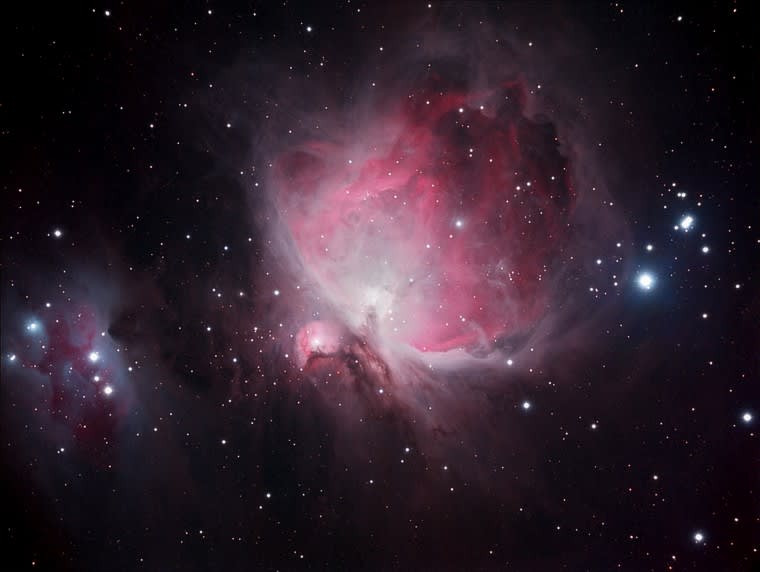 A photograph of the Orion Nebula, showcasing its complex structure and vibrant colors.