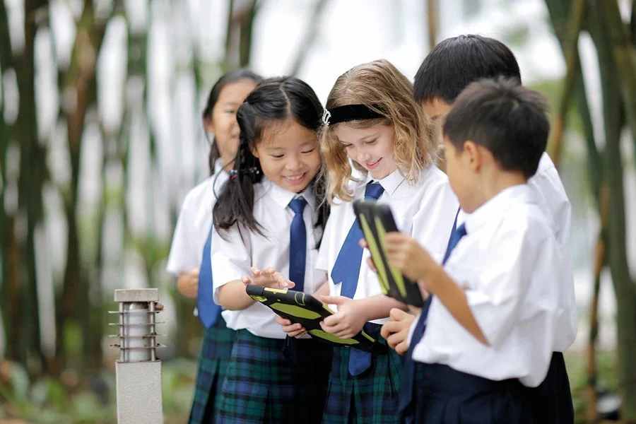 Students at an international school in Sri Lanka using tablets