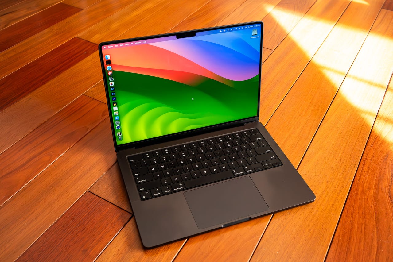 Apple MacBook Pro M3 Pro on a wooden surface