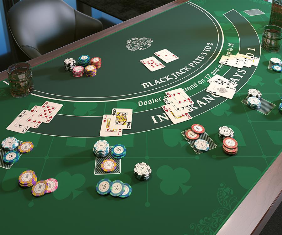 A typical blackjack table layout, including cards and chips