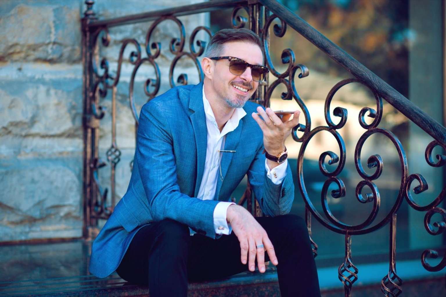 An Entrepreneur Using Voice Search On A Smartphone