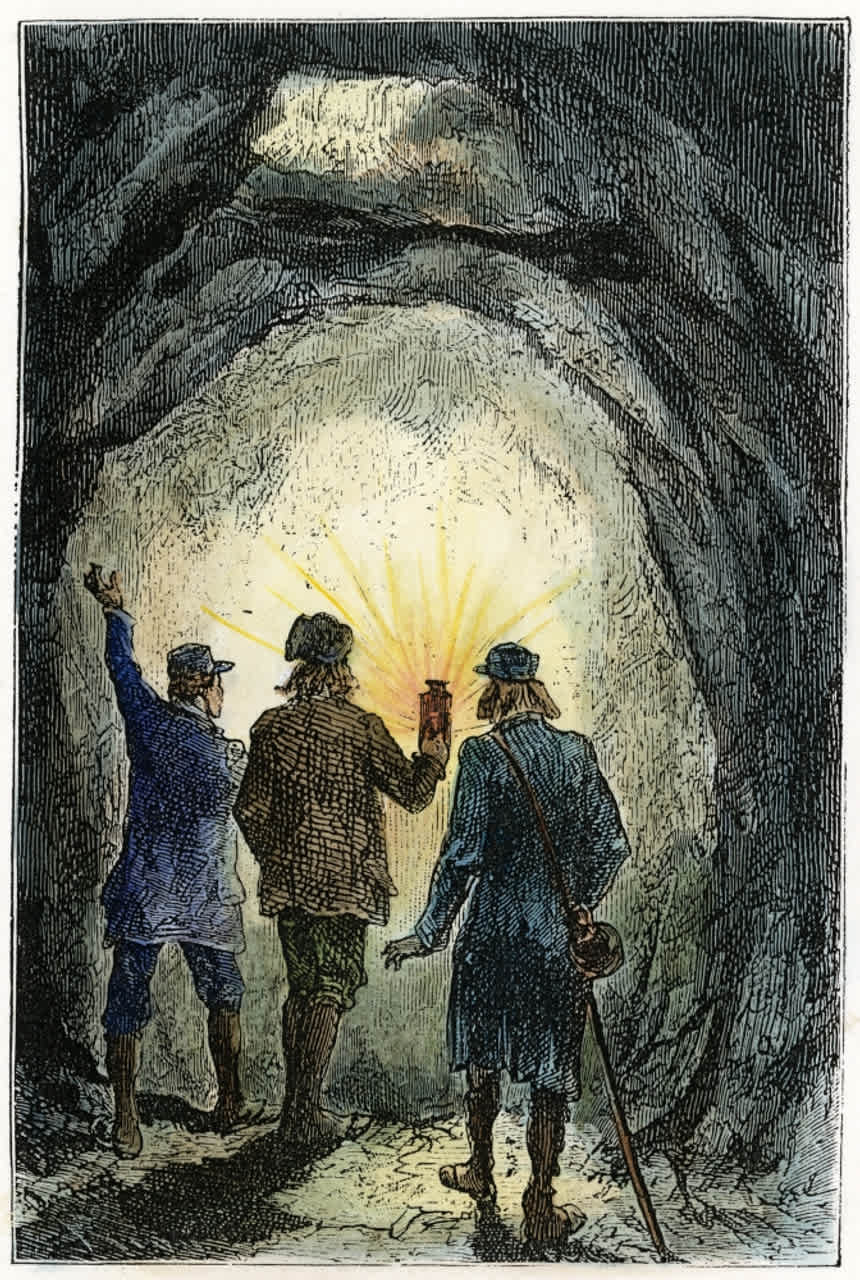 Explorers light their way through a dark subterranean passage, a classic depiction of venturing into an underground world.