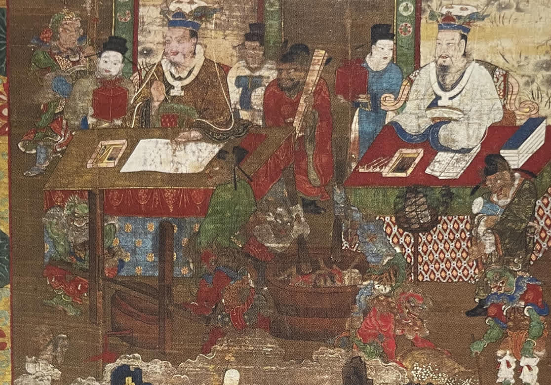 A classical Japanese painting depicting hell judges, likely King Enma-ō, presiding over the judgment of souls with demons inflicting punishments in the Buddhist underworld.