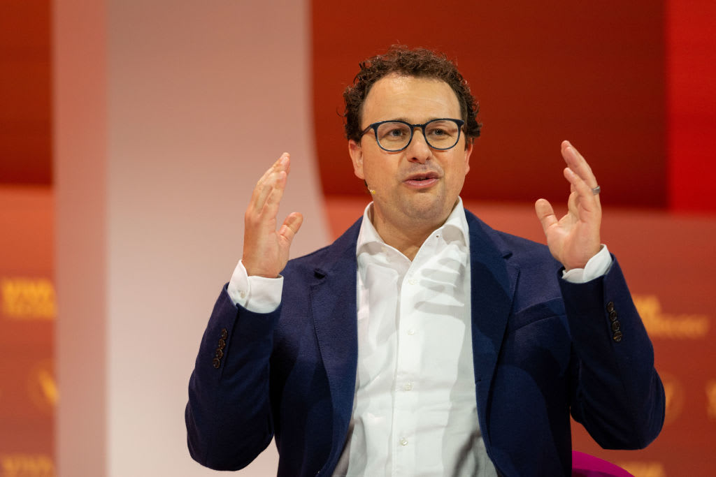 Dario Amodei, CEO of Anthropic, speaking at an AI event, highlighting his role in AI safety and leadership.