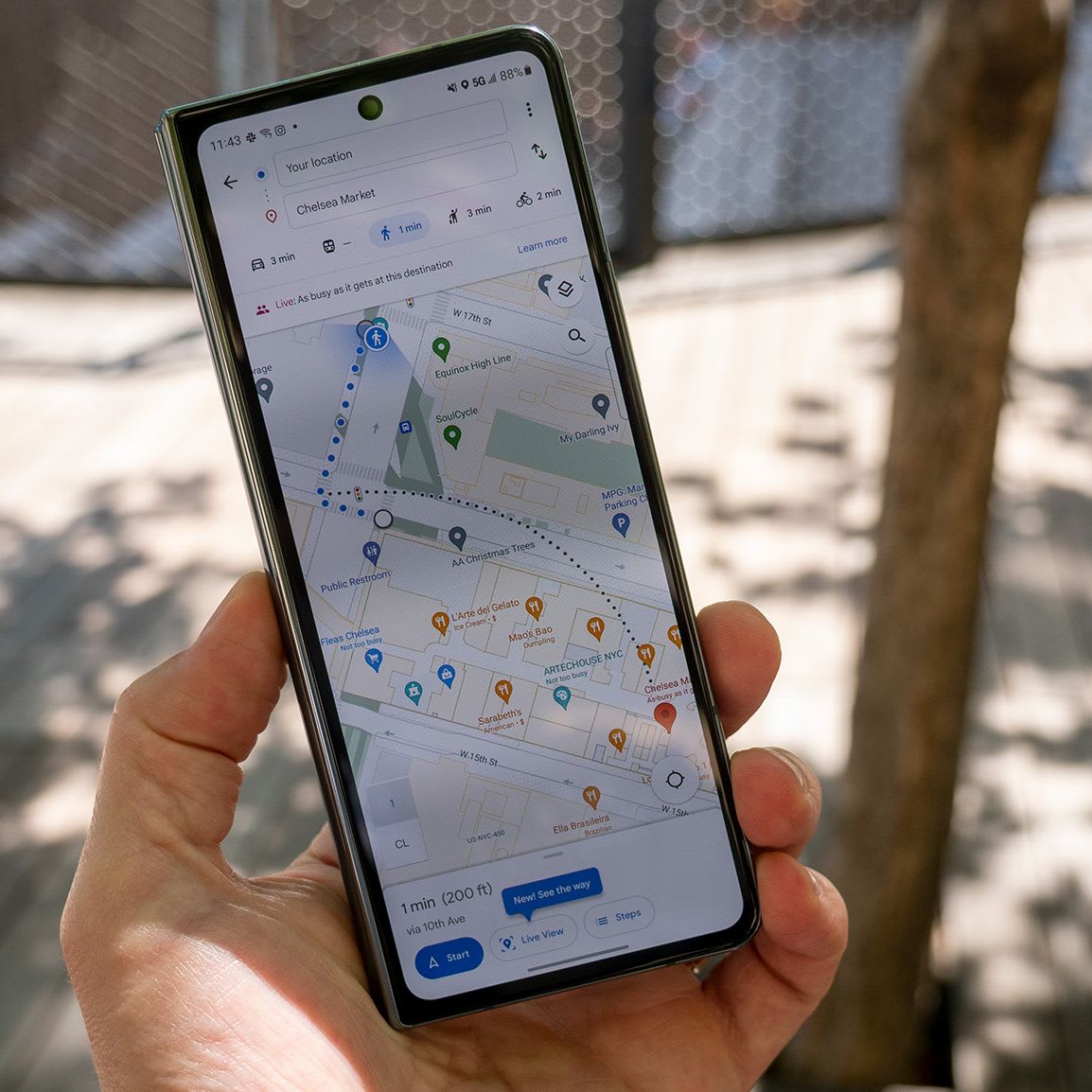 A smartphone screen displays Google Maps showing navigation and local restaurant listings