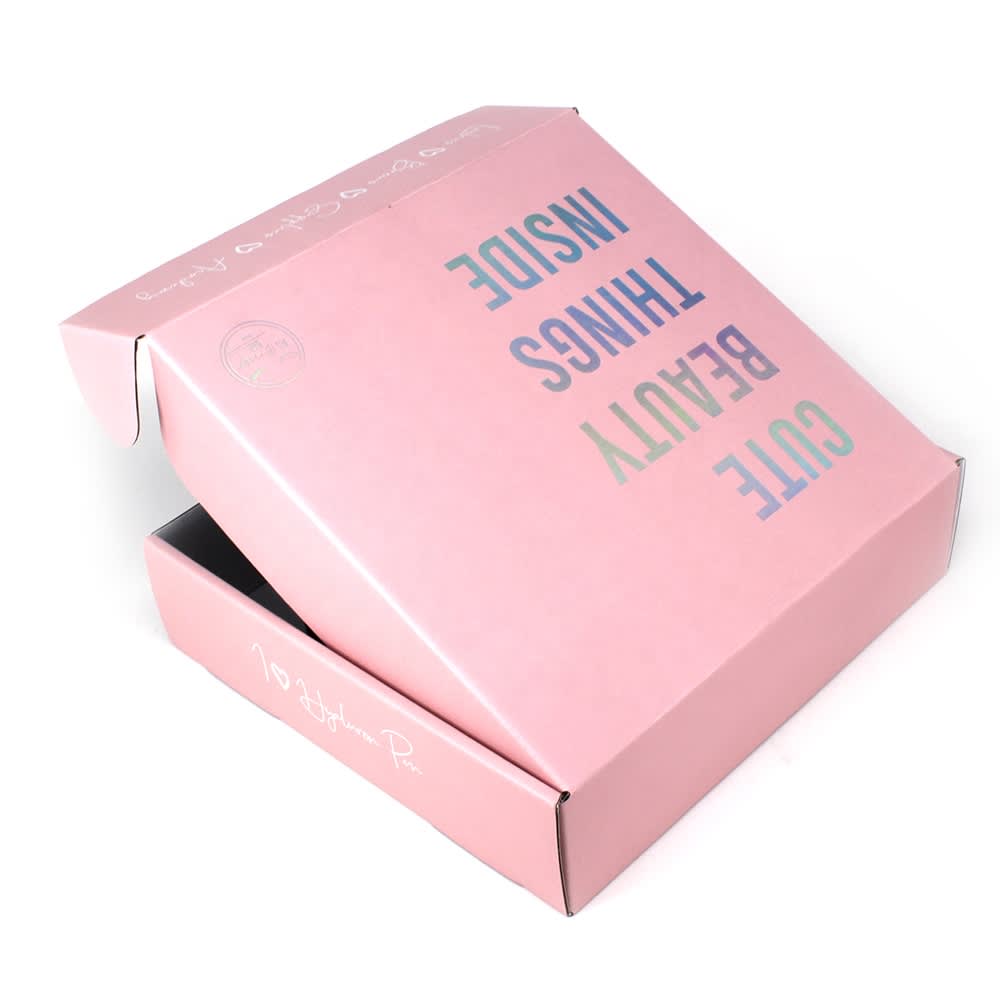 Beautiful pink mailer box for brush cleaning service