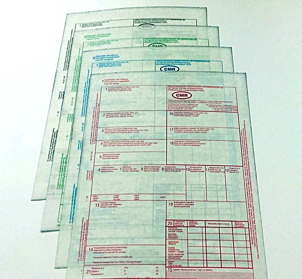 A stack of multi-part CMR consignment notes used for international road transport of goods