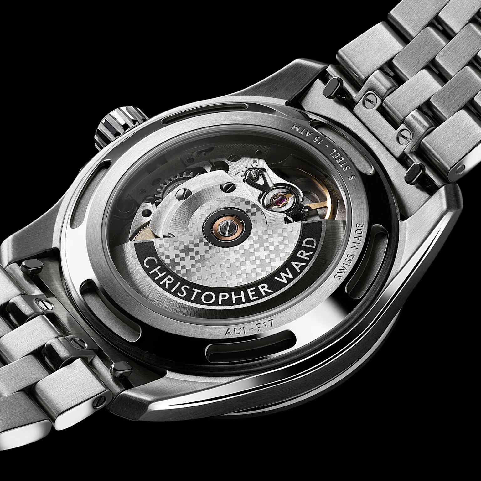 Rear view of a Christopher Ward C63 Sealander automatic watch, showcasing its intricate mechanical movement and stainless steel construction
