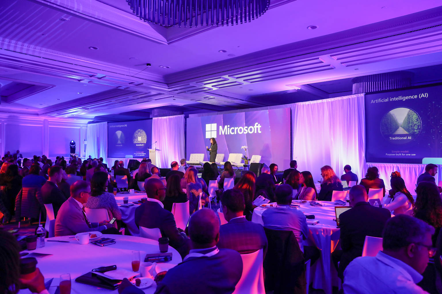 Government and industry leaders attend a Microsoft-hosted conference focused on artificial intelligence strategies and innovations