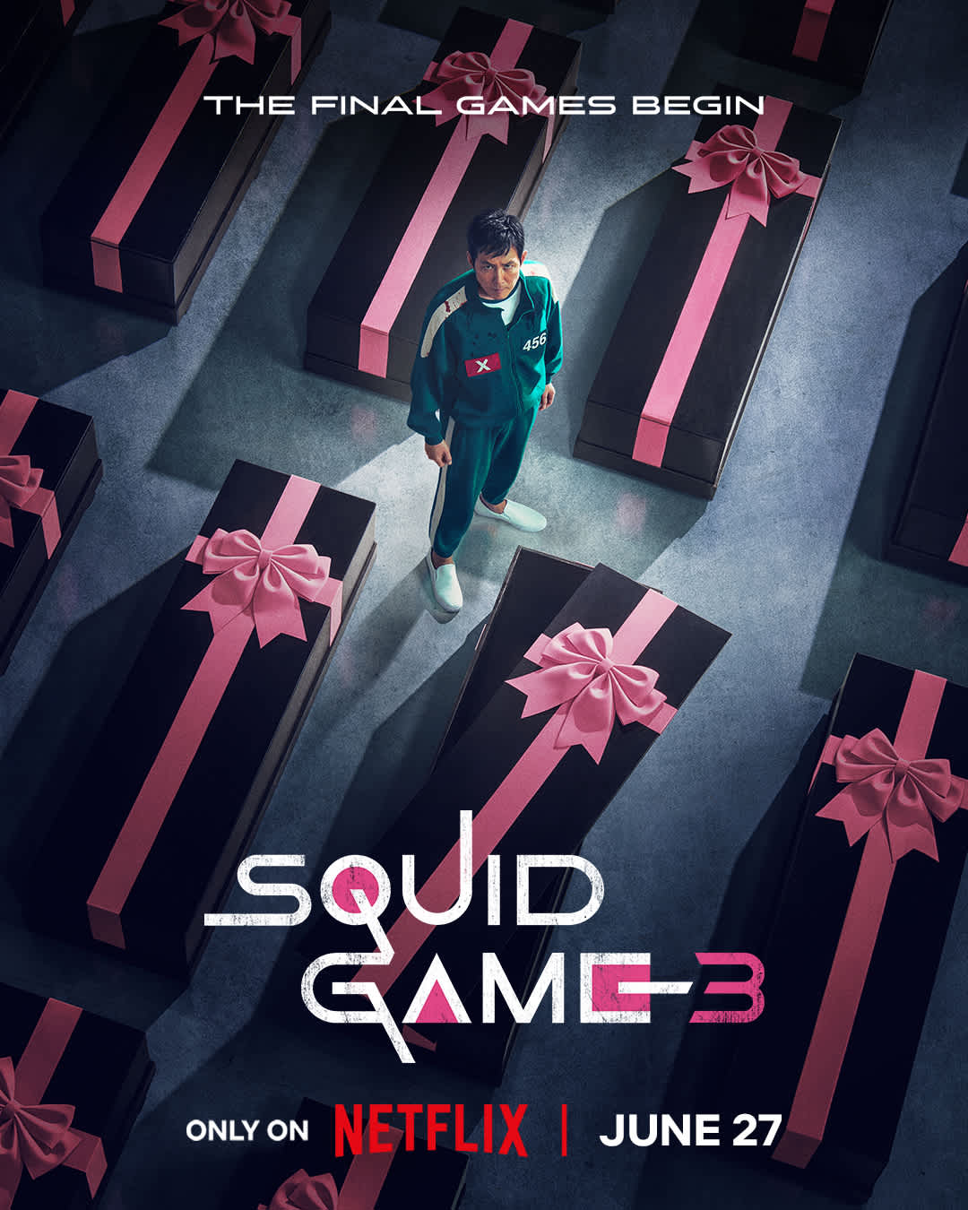 Promotional poster for Squid Game 3 featuring Seong Gi-hun surrounded by black gift-like boxes, indicating a June 27 release on Netflix.