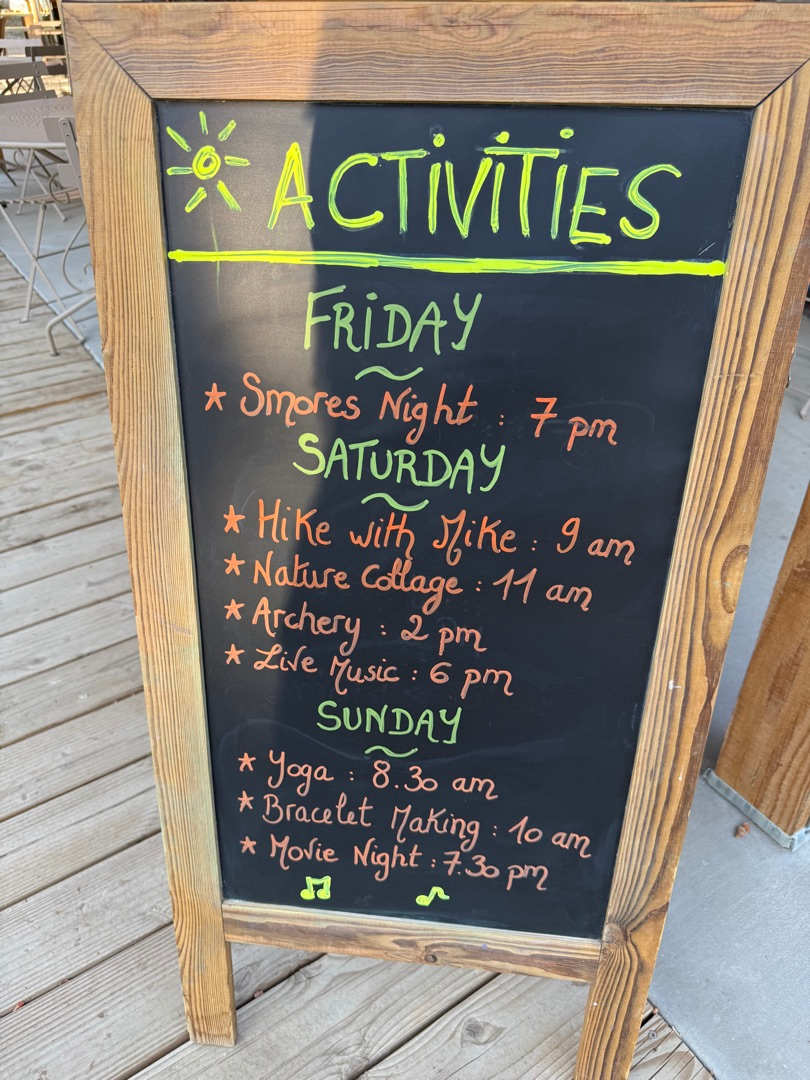 Huttopia Paradise Springs Activities Board with family-friendly schedule