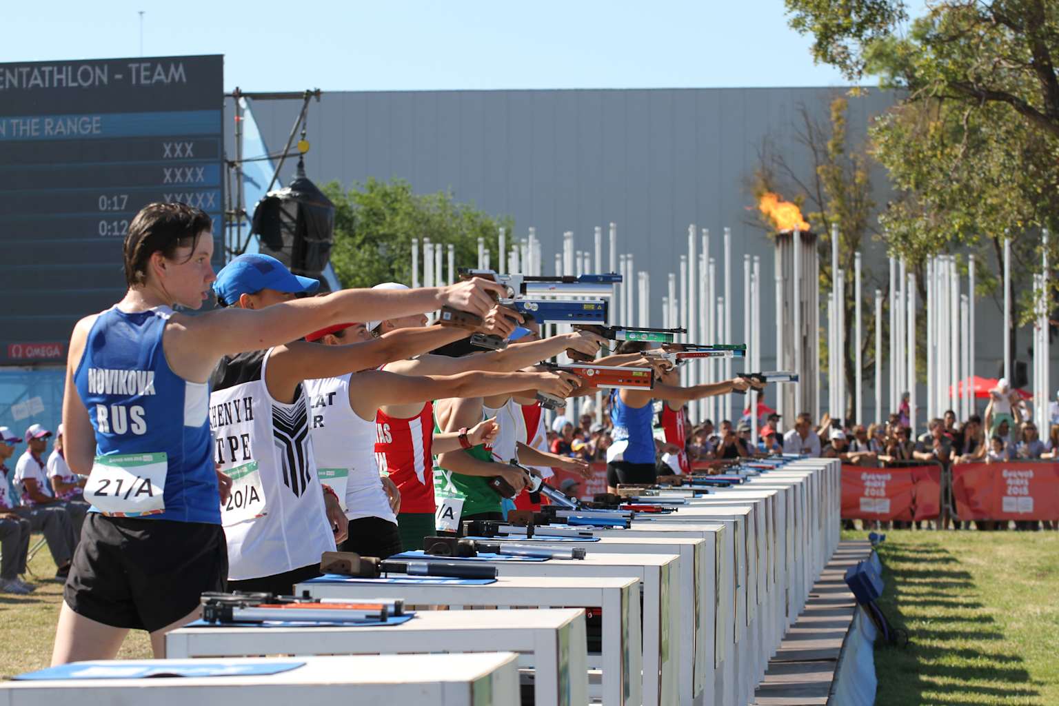Athletes competing in the laser run shooting discipline of modern pentathlon