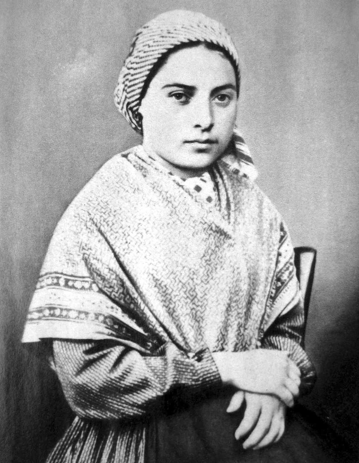 A black and white portrait of Bernadette Soubirous