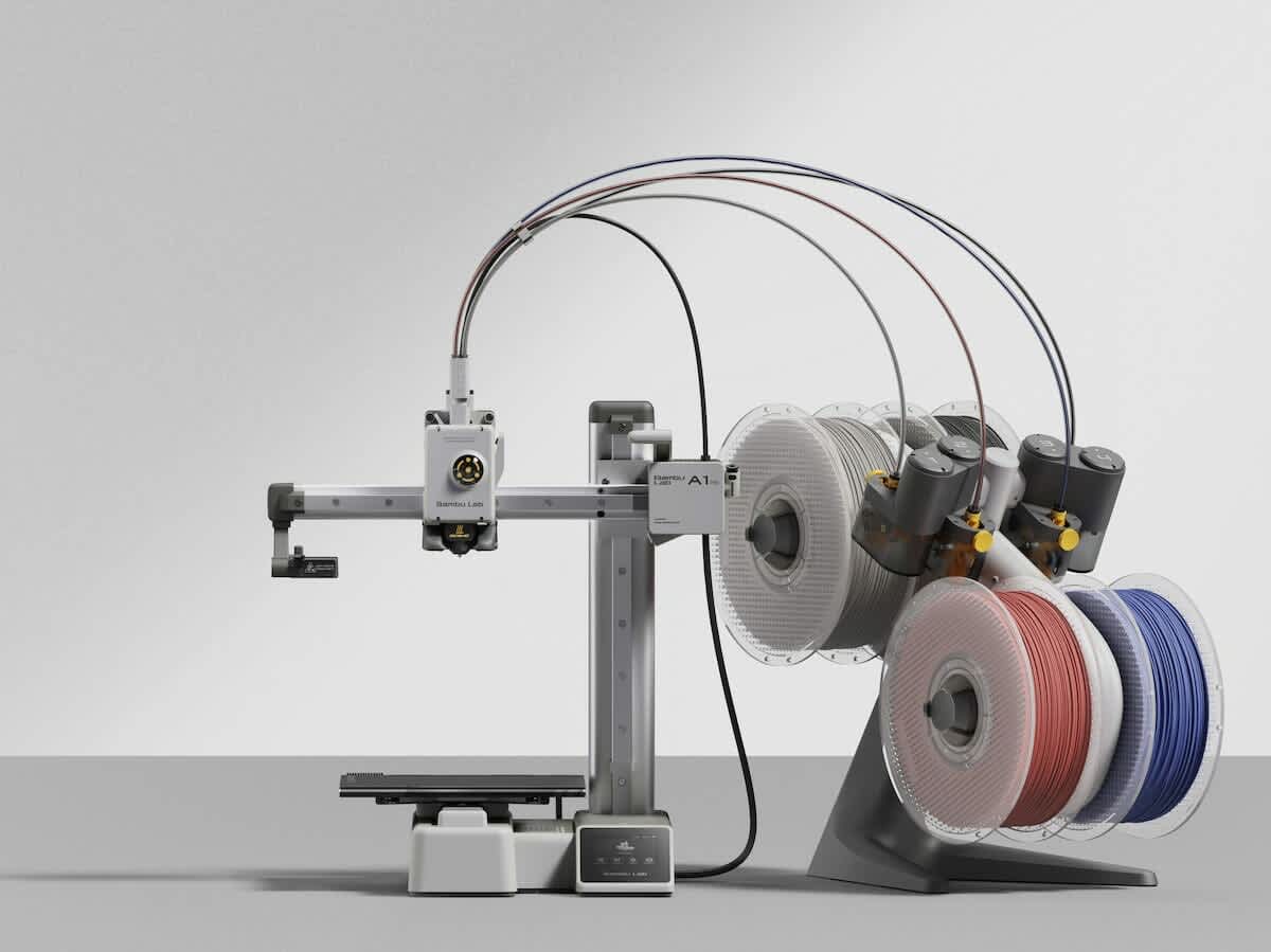 Bambu Lab A1 Mini 3D printer with automated calibration and multi-material filament setup