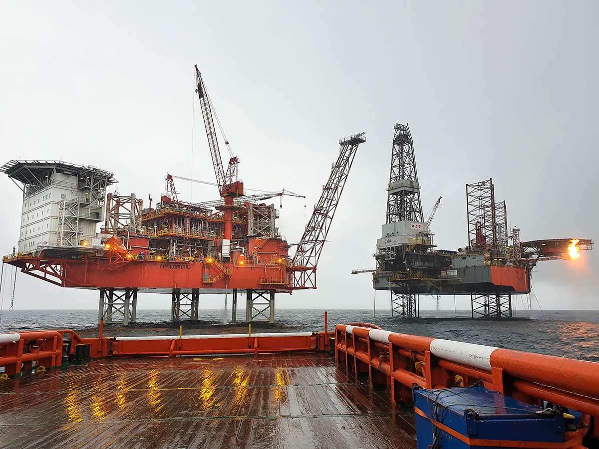 Offshore drilling platforms operated by Petrobaltic on the Baltic Sea showing active oil extraction infrastructure