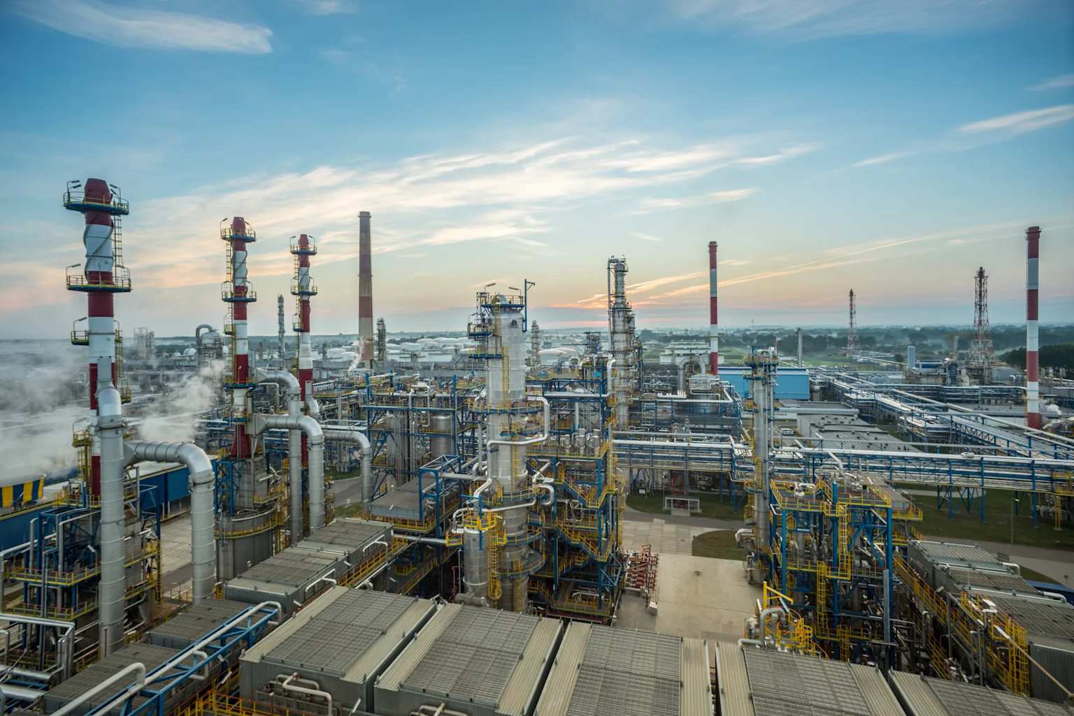 Modern oil refinery complex in Gdańsk illustrating Poland's petroleum processing infrastructure near the Baltic Sea