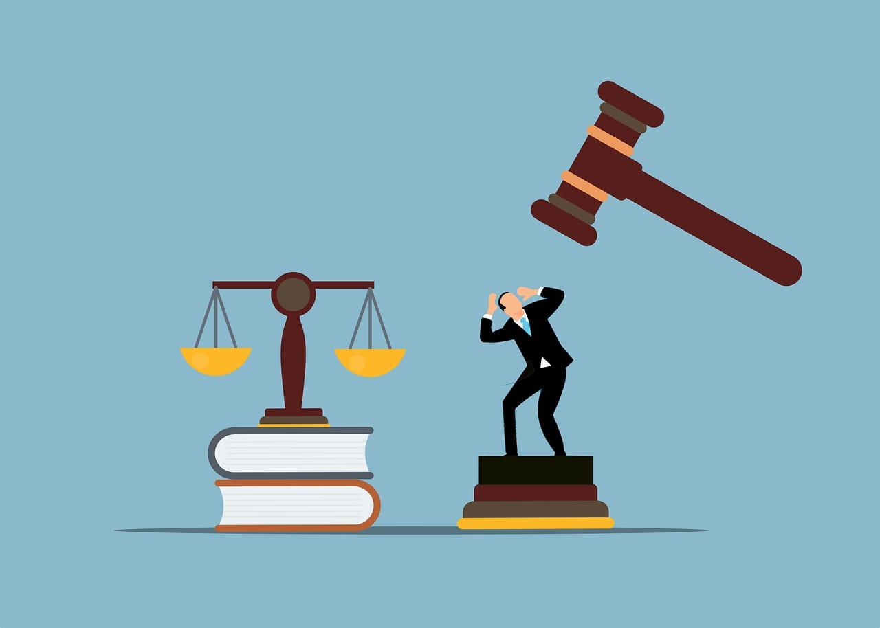 Illustration of legal tension showing a man under pressure from a gavel with scales of justice and law books symbolizing legal balance