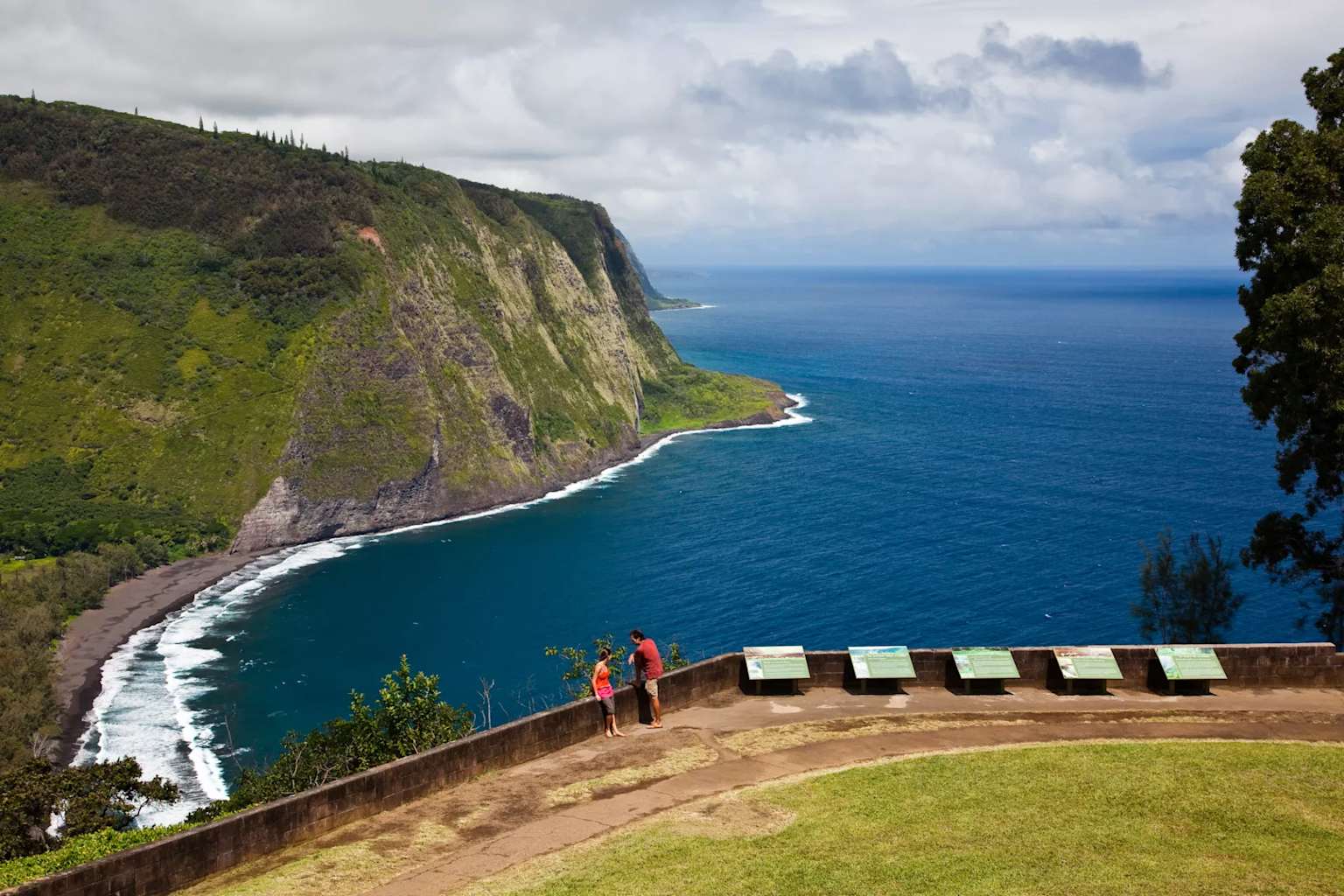 Waipio Valley Overlook showcasing steep cliffs and deep blue ocean on Hawaii's Big Island