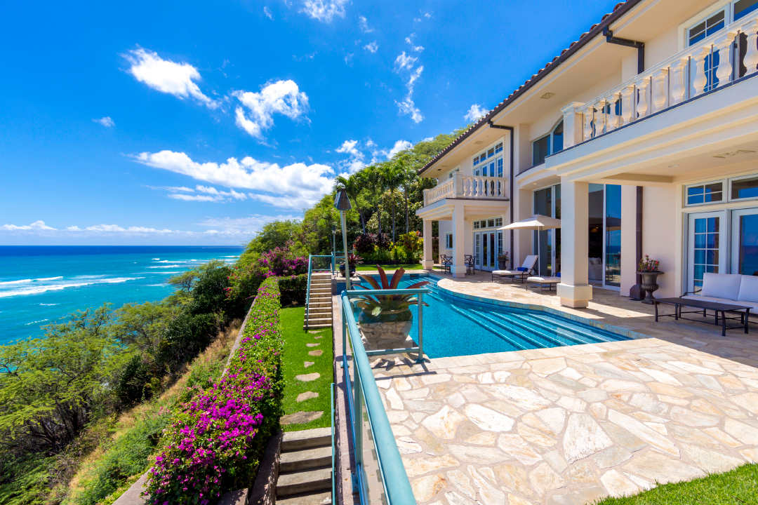 Luxury oceanfront estate in Hawaii's Diamond Head neighborhood with stunning pool and scenic views