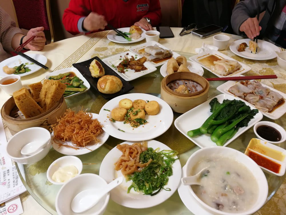A variety of authentic Chinese dim sum and traditional dishes served at an Oakland Chinatown restaurant, highlighting affordable and delicious Asian food options