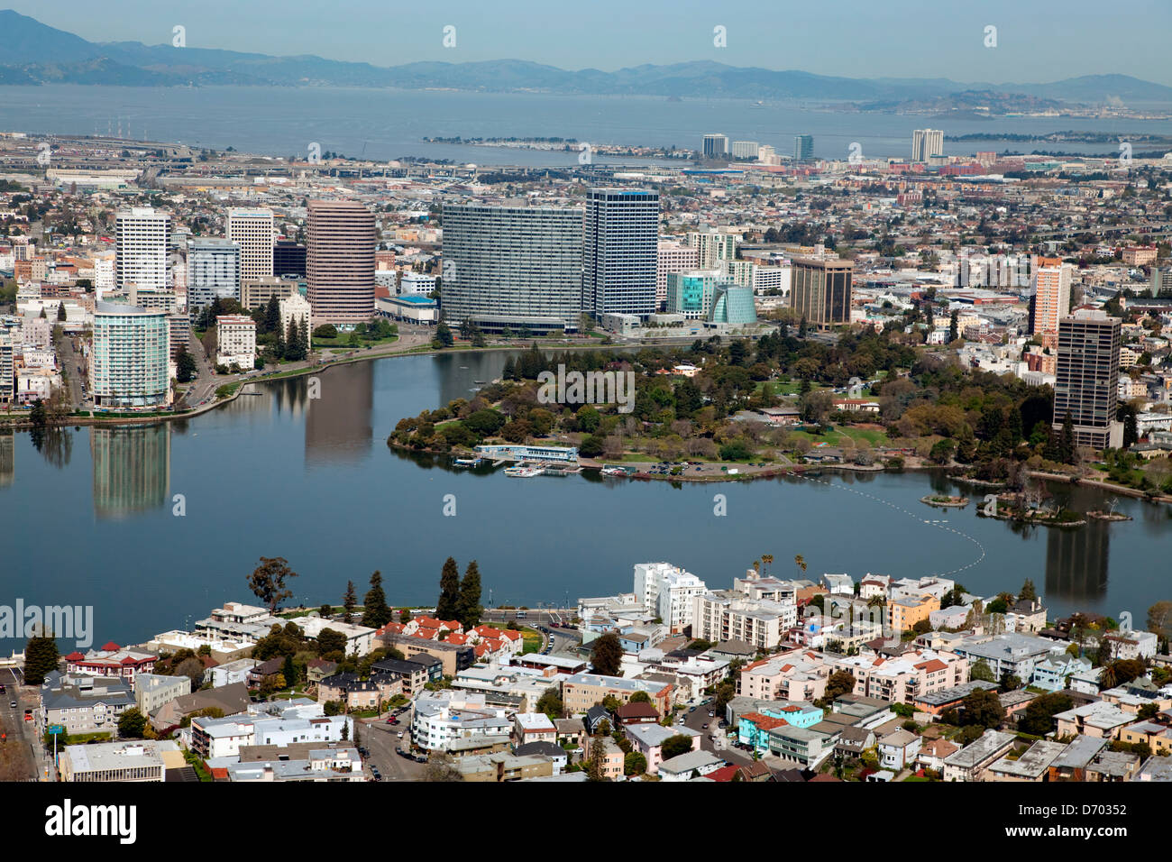 Aerial view of downtown Oakland, California featuring Lake Merritt and surrounding buildings