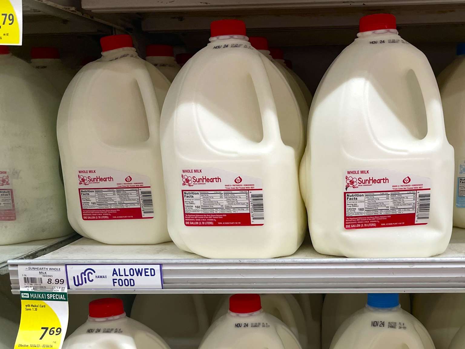 One gallon of whole milk costs nearly nine dollars in a Hawaii grocery store, exemplifying high food prices for visitors