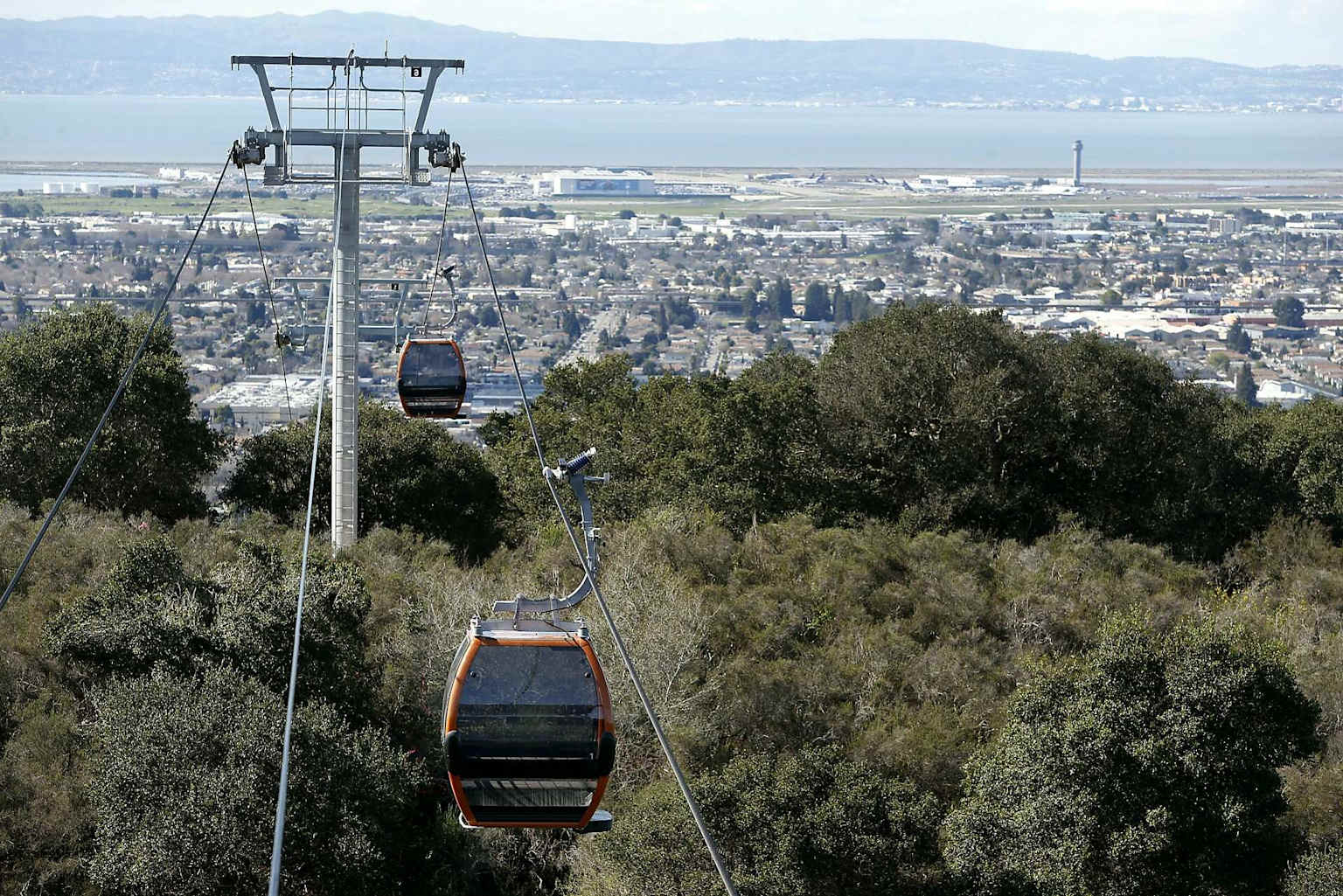 Gondola cabins at Oakland Zoo's California Trail exhibit offering scenic views of the zoo and city beyond