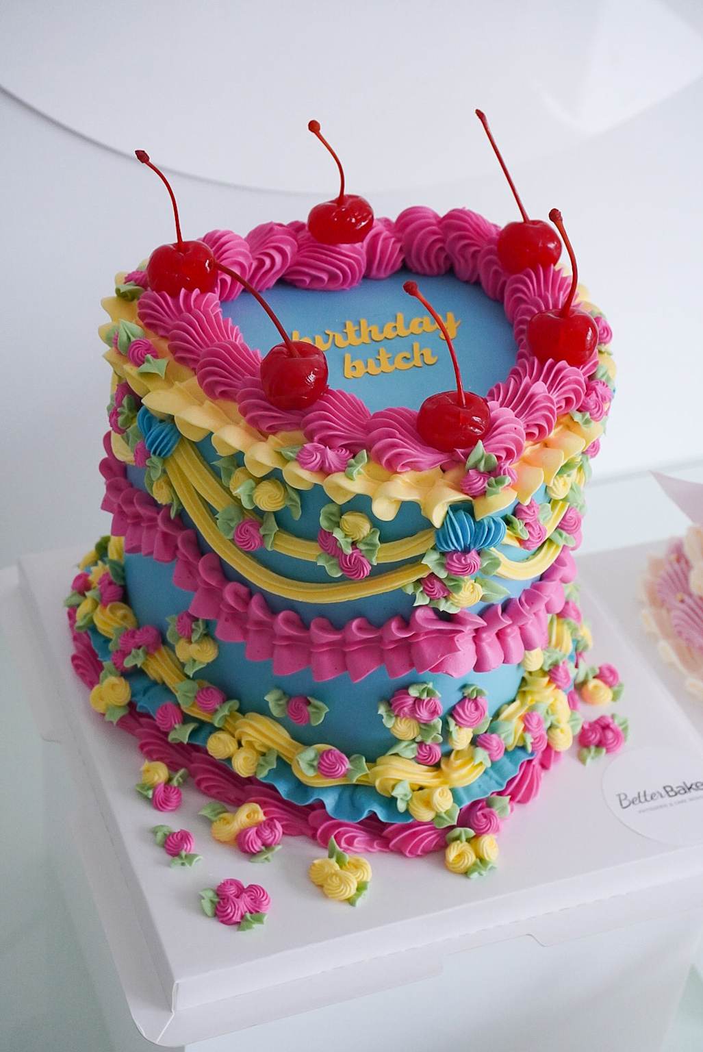 Custom decorated corporate cake with colorful frosting