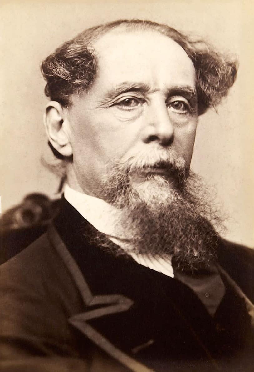 Sepia-toned portrait of a 19th-century man with prominent sideburns and formal attire typical of historical figures