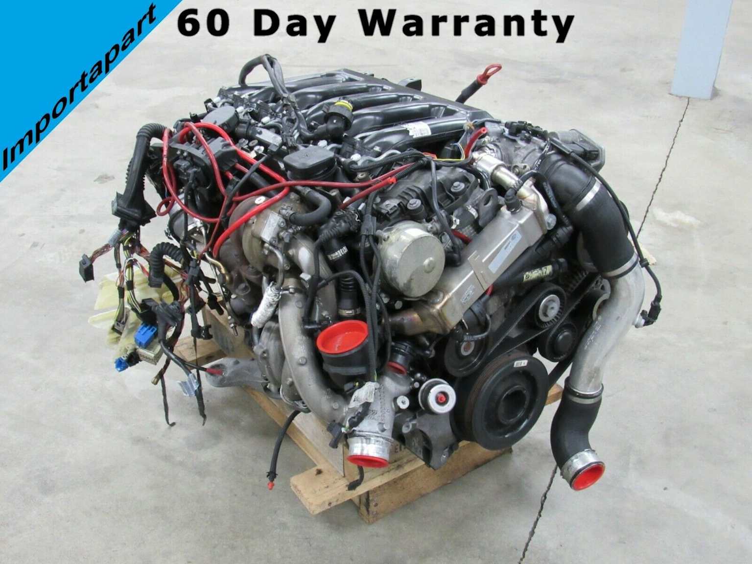 BMW E90 M57 3.0L twin turbo diesel engine assembly with visible components and 60-day warranty from Importapart