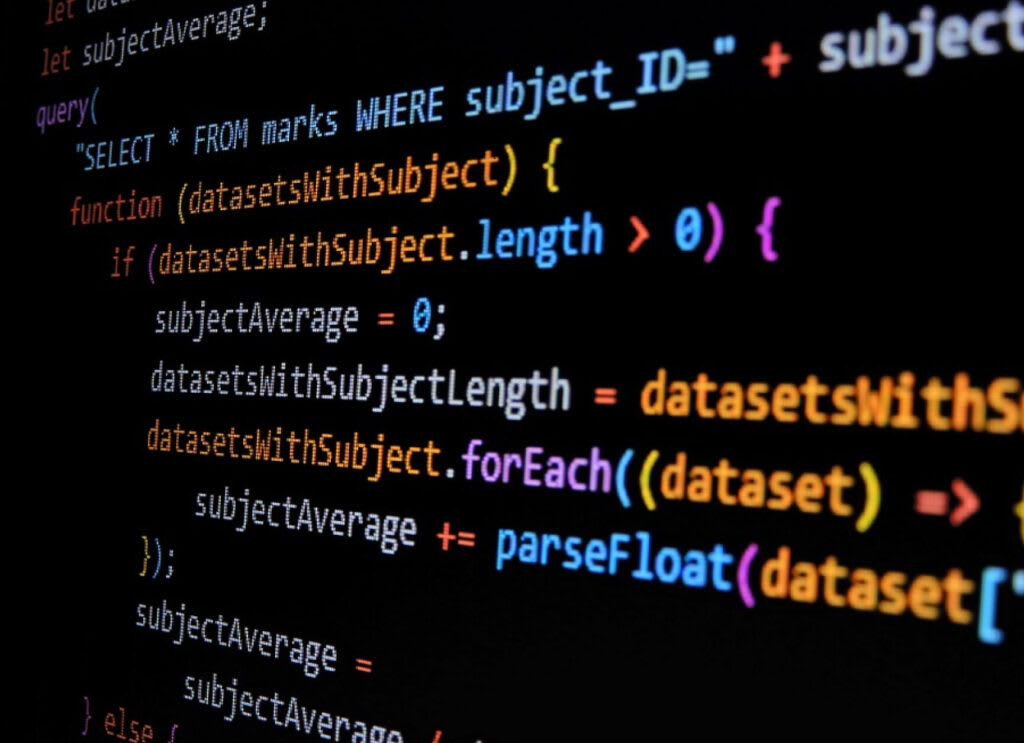 Close-up of JavaScript code processing dataset averages, illustrating technical WordPress development work
